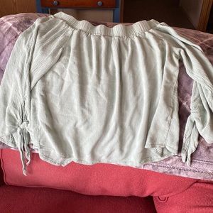 Off the shoulder cute shirt.